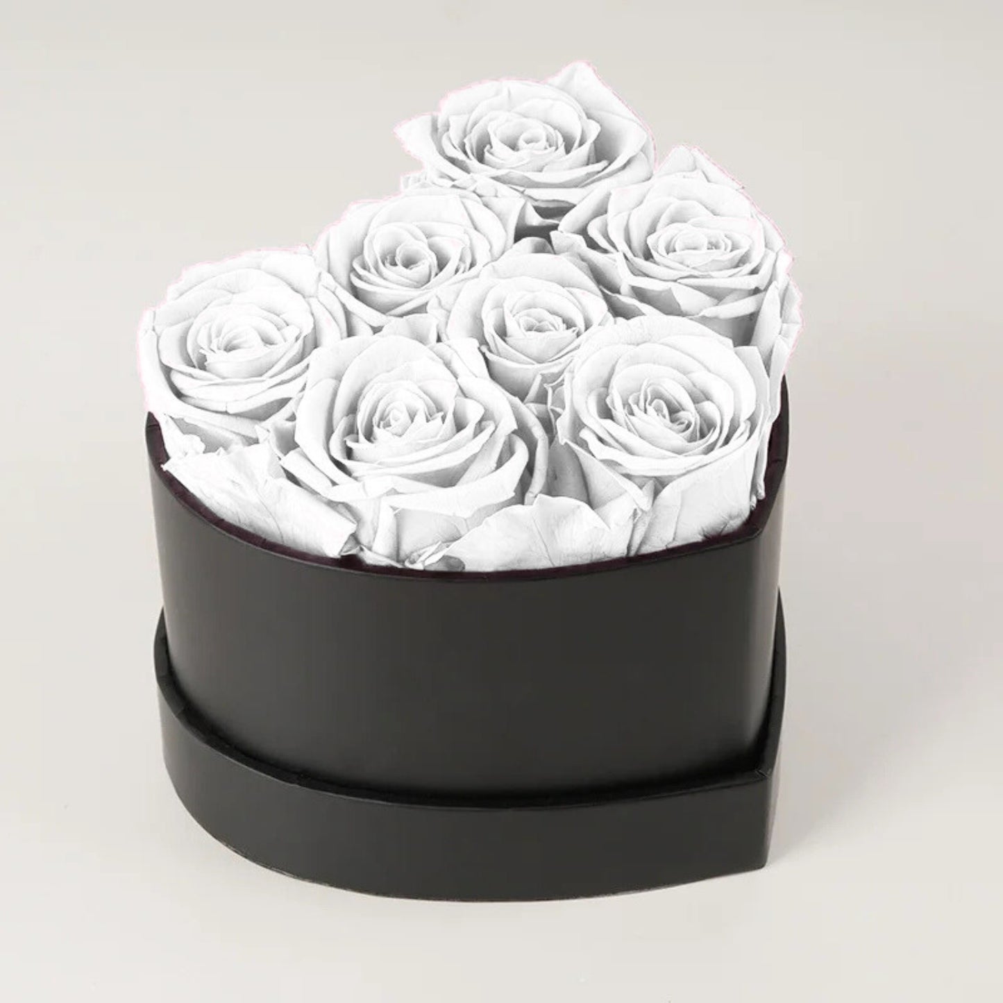 Caja de rosas de corazón eterno con 7 rosas eternas