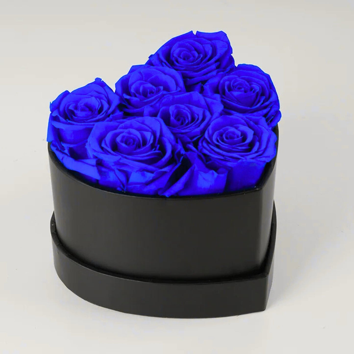 Caja de rosas de corazón eterno con 7 rosas eternas