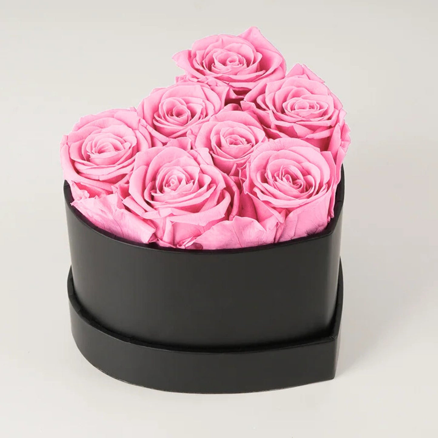 Caja de rosas de corazón eterno con 7 rosas eternas