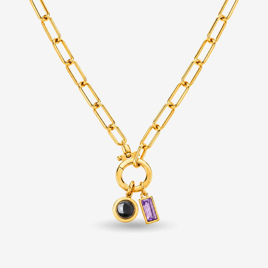 Gold Birthstone and Projection Necklace with paperclip chain, round projection charm, and purple birthstone charm.